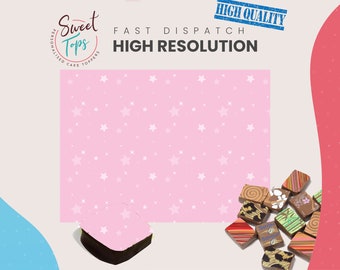 May include: Pink background with white stars. A chocolate bar with a pink icing and white stars on top. A pile of assorted chocolate squares with different designs and colors.