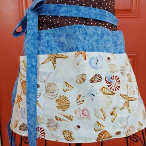 Six pocket half/server apron.  Extra long straps that can be tied in front or back.  Perfect pocket size's for server booklets.