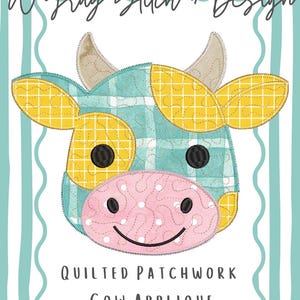 Quiltad lapptäcke med ko-applikation och maskinbroderidesign