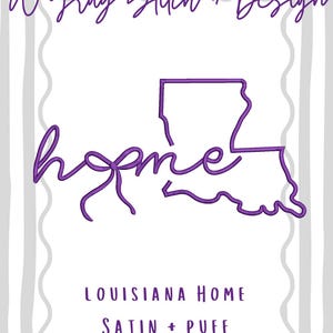 May include: A white card with a purple outline of Louisiana and the word "home" in cursive. The text "A Gray Stitch + Design" is at the top, and "Louisiana Home Satin + Puff" is at the bottom. The background has vertical gray and white stripes.