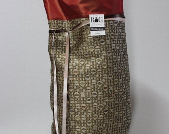 Tan, rust and olive woven fabric gift bag
