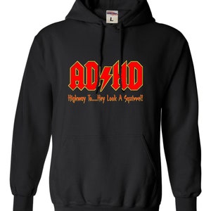 May include: Black hooded sweatshirt with a red and yellow graphic that says "ADHD" and "Highway To...Hey Look A Squirrel!"