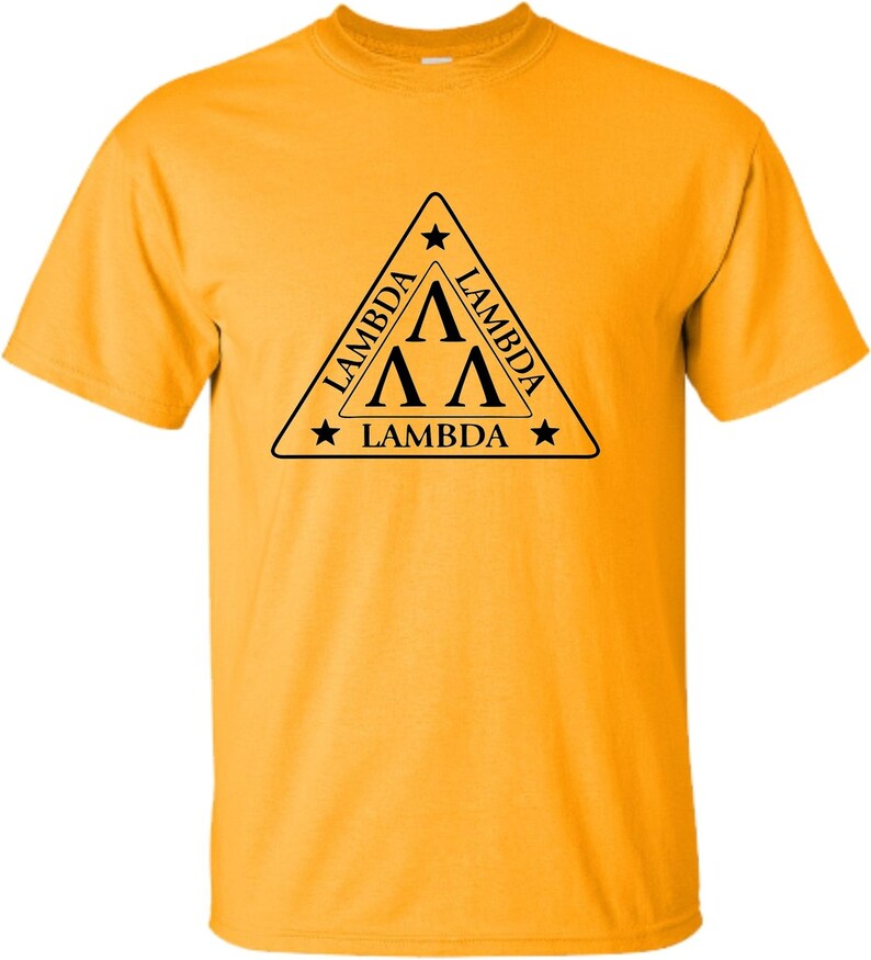 May include: A yellow t-shirt featuring a black triangular logo. The triangle has a star at each point and the text "Lambda" written on each side. Inside the triangle are three black "A"s stacked on top of each other.