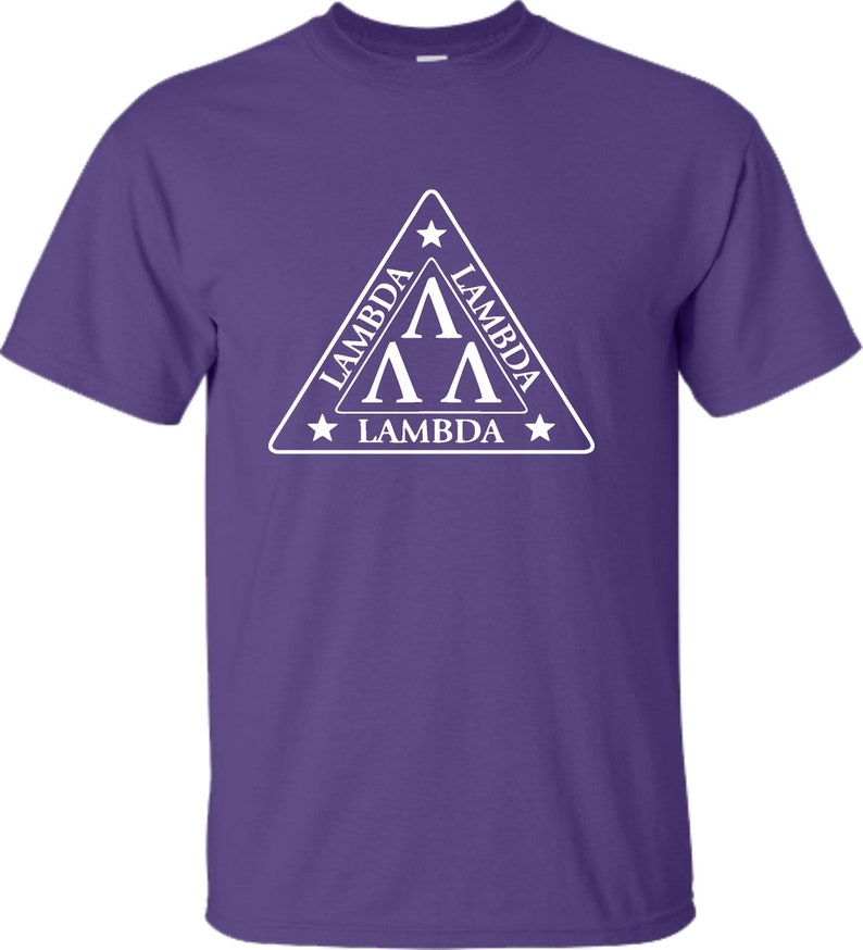 May include: Purple t-shirt with a white triangle logo featuring the text "Lambda" and three white "A"s.