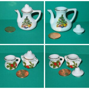May include: A set of miniature Christmas themed teacups and teapot. The teapot and cups are white with a green and red Christmas tree design. The set includes a teapot, two cups, and two lids.