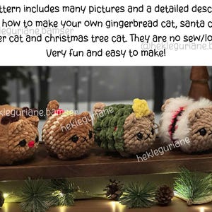 May include: Four small, round, crocheted cat figures featuring different holiday themes: a reindeer cat with antlers, a gingerbread cat, a Christmas tree cat with a yellow star, and a Santa cat with white fur trim and a red stripe.