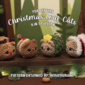 May include: Four crocheted cat figures arranged on a wooden tray, featuring a reindeer cat, a striped cat, a green textured cat with a yellow star, and a white cat with red and black stripes. Text reads: PDF PATTERN Christmas Loaf Cats 4 in 1 PATTERN.