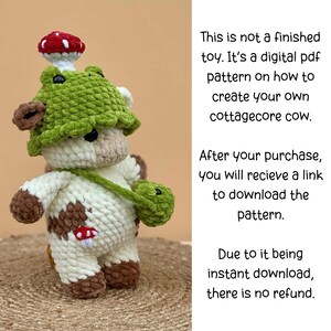 May include: A crocheted cow toy with a green mushroom hat and a small green bag. The cow is white with brown spots and a red mushroom patch. The image includes text stating it is a digital PDF pattern for a cottagecore cow.