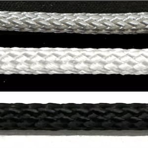 May include: Three samples of braided rope in grey, white, and black.