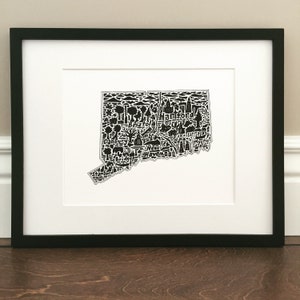 May include: Black and white print of the state of Connecticut, with the major cities and towns outlined in black. The print is framed in a black frame.