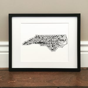 North Carolina Map Art Print - Print of hand drawn map including North Carolina landmarks, culture, symbols, and cities