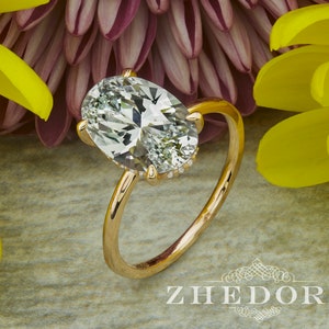 Anillo de compromiso ovalado alargado de oro amarillo de 4 quilates, anillo ovalado con halo oculto, anillo de compromiso de corte ovalado, solitario Forever One Oval, halo oculto