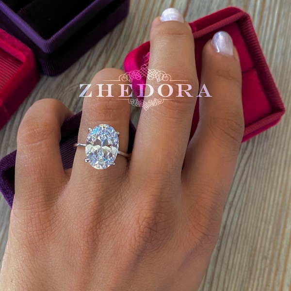 Anillo de compromiso de moissanita ovalada alargada de 6 quilates, halo oculto, oro blanco de 14k.