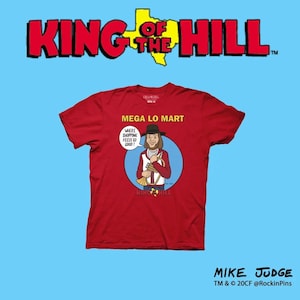 May include: Red t-shirt featuring a cartoon illustration of a man with a mustache and a hat, holding a trumpet. The text "MEGA LO MART" and "WHERE SHOPPING FEELS SO GOOD!" are printed on the shirt. The text "KING OF THE HILL" is printed below the illustration.