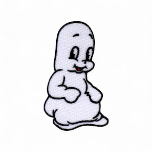 May include: A white embroidered patch featuring a cartoon ghost with a friendly expression. The ghost has black eyes, a small red mouth, and a black outline. The patch is designed to be ironed or sewn onto fabric.