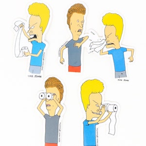 May include: Set of four stickers featuring the animated character Beavis from the television show Beavis and Butt-Head. Each sticker shows Beavis in a different pose, including holding a roll of toilet paper, sneezing, looking through a roll of toilet paper, and looking through a roll of toilet paper. The stickers are white with black outlines and feature the text "MIKE JUDGE" at the bottom.