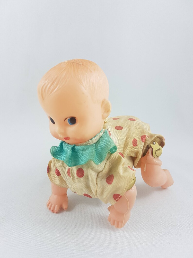 vintage crawling baby doll
