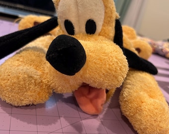 Pluto plus, Mickey, Disney characters. About 11 inches long. Disney Authentic Original Pluto Plush Stuffed Animal
