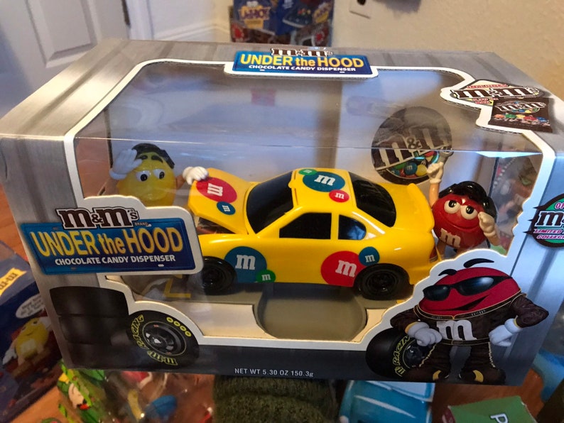 Chocolate disperser Never opened. Under the hood M/&m/'s dispenser
