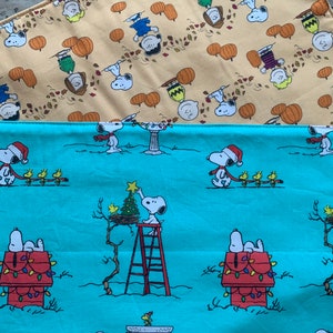NEW Handmade REVERSIBLE quilted table runner. Snoopy Christmas decorations/Fall fabric, peanuts decorations, retired fabric~