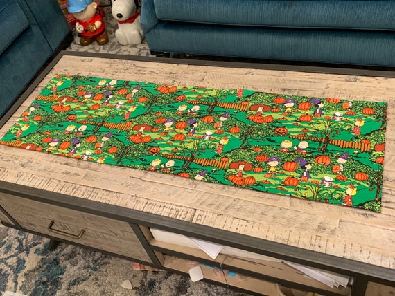 Fall and winter fabrics Choose from 2 options. Peanuts Snoopy fabrics New REVERSIBLE table runner table topper CHRISTMAS and HALLOWEEN