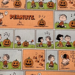 Linus and Lucy fabric. Great pumpkin. Comics. Sold by the half yard, if you buy two or more I&#39;ll send the fabric in one piece. Peanuts fabri