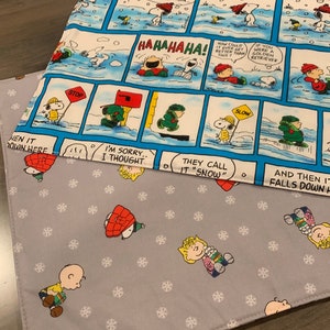 NEW Handmade REVERSIBLE quilted table runner. Snoopy Christmas decorations/ Christmas fabric, peanuts decorations New fabric.