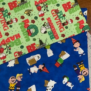 New REVERSIBLE table runner/ table topper. CHRISTMAS and HALLOWEEN. Peanuts/ Snoopy fabrics. Fall and winter fabrics. One Retired fabric