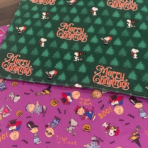 NEW Handmade REVERSIBLE quilted table runner. Snoopy Christmas decorations/Halloween fabric, peanuts decorations New fabric.