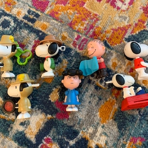 Lot of 7 Snoopy toys. McDonalds toys. Snoopy, Linus and Lucy.