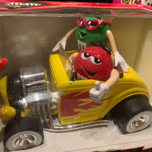 New in box Chocolate disperser, rebel without a clue candy dispenser. M&m&#39;s dispenser. Yellow collectible Road car candy dispenser.