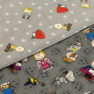 New reversible quilted handmade table runner, Christmas/ Halloween, Charlie Brown. Peanuts gang. Snoopy