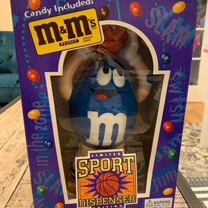 Chocolate disperser Never opened. Under the hood M/&m/'s dispenser