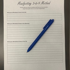 May include: A printable worksheet with the title "Manifesting 3-6-9 Method". The worksheet has instructions to write affirmations 3 times in the A.M., 6 times in the afternoon, and 9 times in the P.M.