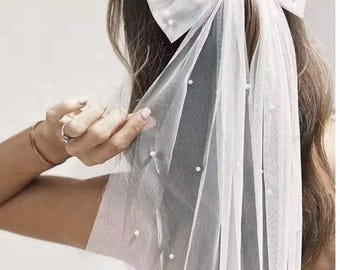 Lazo para el cabello de novia, velo, adorno para el cabello de boda con perlas, lazo de tul blanco con clip, nuevo.
