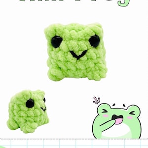 May include: A green crocheted frog plush toy with black eyes. The frog is smiling and has a small, round body. The text "Mini Frog" is written above the frog.