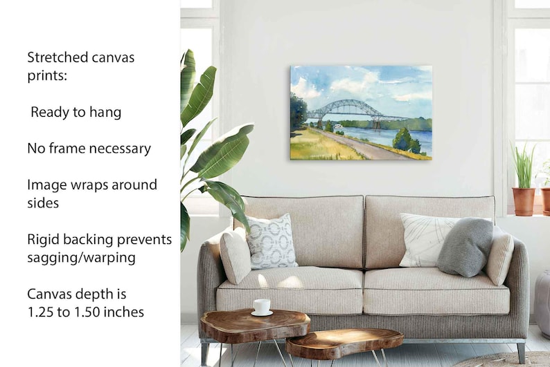 May include: A stretched canvas print of a watercolor painting of a bridge over a river. The canvas depth is 1.25 to 1.50 inches. The print is ready to hang, with no frame necessary, and the image wraps around the sides.