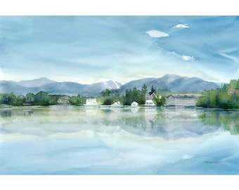 May include: A watercolor painting of a lake with mountains in the background. The lake is calm and reflects the sky and mountains. There are trees and buildings on the shore of the lake.