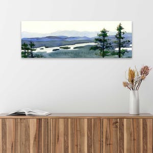 May include: A watercolor painting of a landscape with a river winding through a valley. The river is surrounded by trees and mountains in the distance. The sky is a light blue with a few clouds.