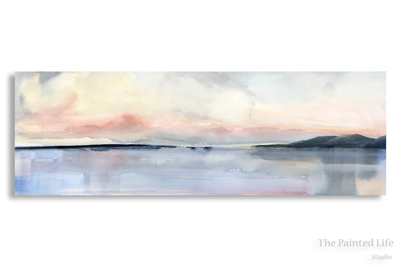 May include: A watercolor painting of a seascape with a soft pink and yellow sky, a dark blue horizon, and a light blue reflective water surface.