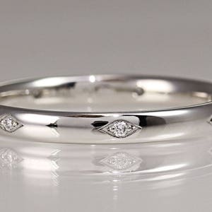 platinum 3 diamond 2mm court shape wedding ring with 3 diamonds to front diamond wedding ring platinum diamond ring