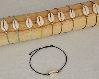 Shell bracelet or shell anklet with brass beads