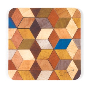 May include: Square wooden coaster with a geometric pattern of various wood tones, including light, medium, and dark browns, yellows, and a single blue diamond. The coaster has rounded corners and a signature in the bottom right corner.