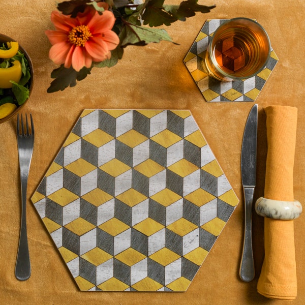 Small placemats of the highest quality. Mustard Yellow and greys. Hexagonal shape. Heat resistant melamine. Set of 2, 4 or 6 made in UK