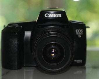 Canon EOS 1000S reflex 35mm camera + Canon EF 35-80 1:4-5.6 USM in good condition