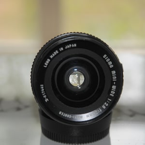 Lente gran angular Sigma Mini-Wide 28mm 2.8 para Canon FD en condiciones razonables
