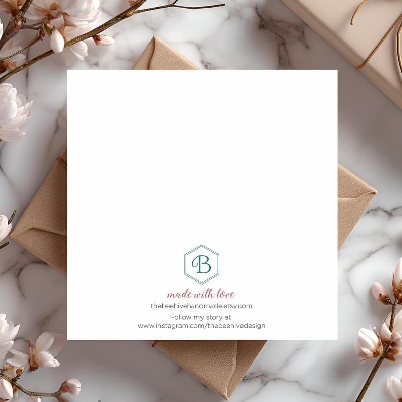 May include: A white card with a teal blue hexagon logo with the letter "B" inside. The text "made with love" is in pink below the logo. The text "thebeehivehandmade.etsy.com" is in black below the pink text. The text "Follow my story at www.instagram.com/thebeehivedesign" is in black below the website address.