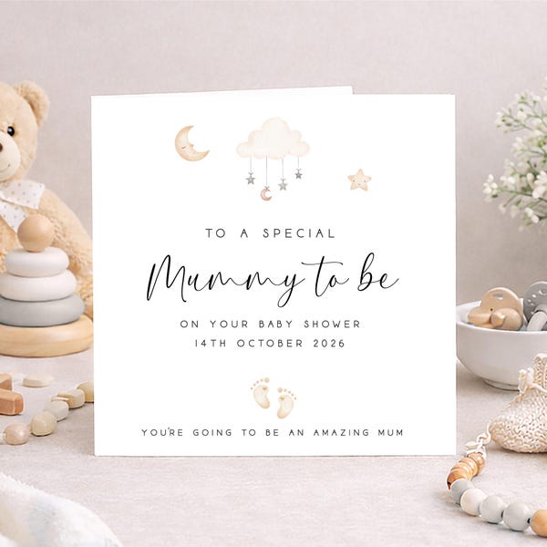 May include: A white square greeting card with black text reading TO A SPECIAL Mummy to be ON YOUR BABY SHOWER 14TH OCTOBER 2026 and YOU'RE GOING TO BE AN AMAZING MUM. The card features watercolor illustrations of a moon, cloud, stars, and baby feet.