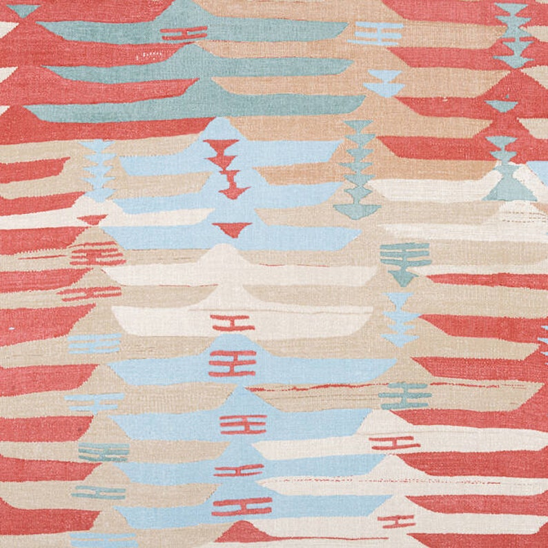 May include: A patterned textile with a repeating geometric design. The design incorporates horizontal bands in red, light blue, beige, and white. The pattern creates a layered effect, suitable for home decor items such as rugs or wall hangings.