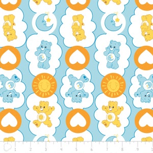 May include: A blue and yellow fabric with a repeating pattern of Care Bears. The bears are wearing different expressions and holding a moon, a sun, or a heart. The background is a light blue color.